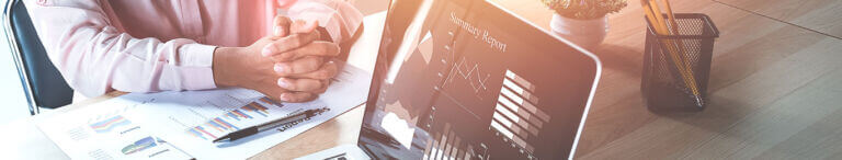 man reviewing graphs