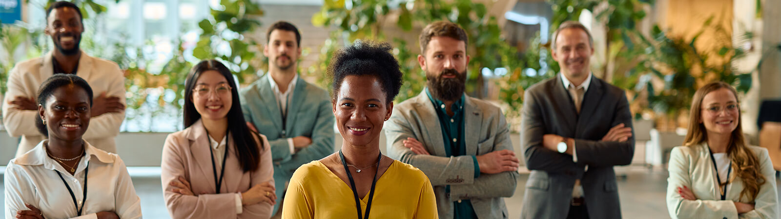 Image of a smiling diverse business team