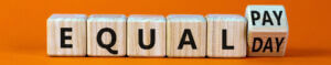 blocks spelling out equal pay