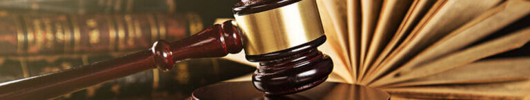 gavel next to open book