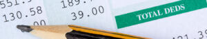 pencil with paystub