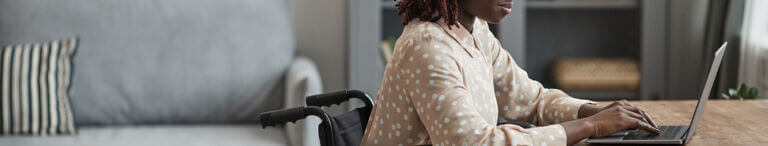 woman in wheelchair working remotely