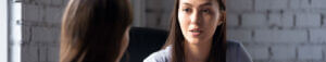 women having serious conversation