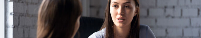 women having serious conversation