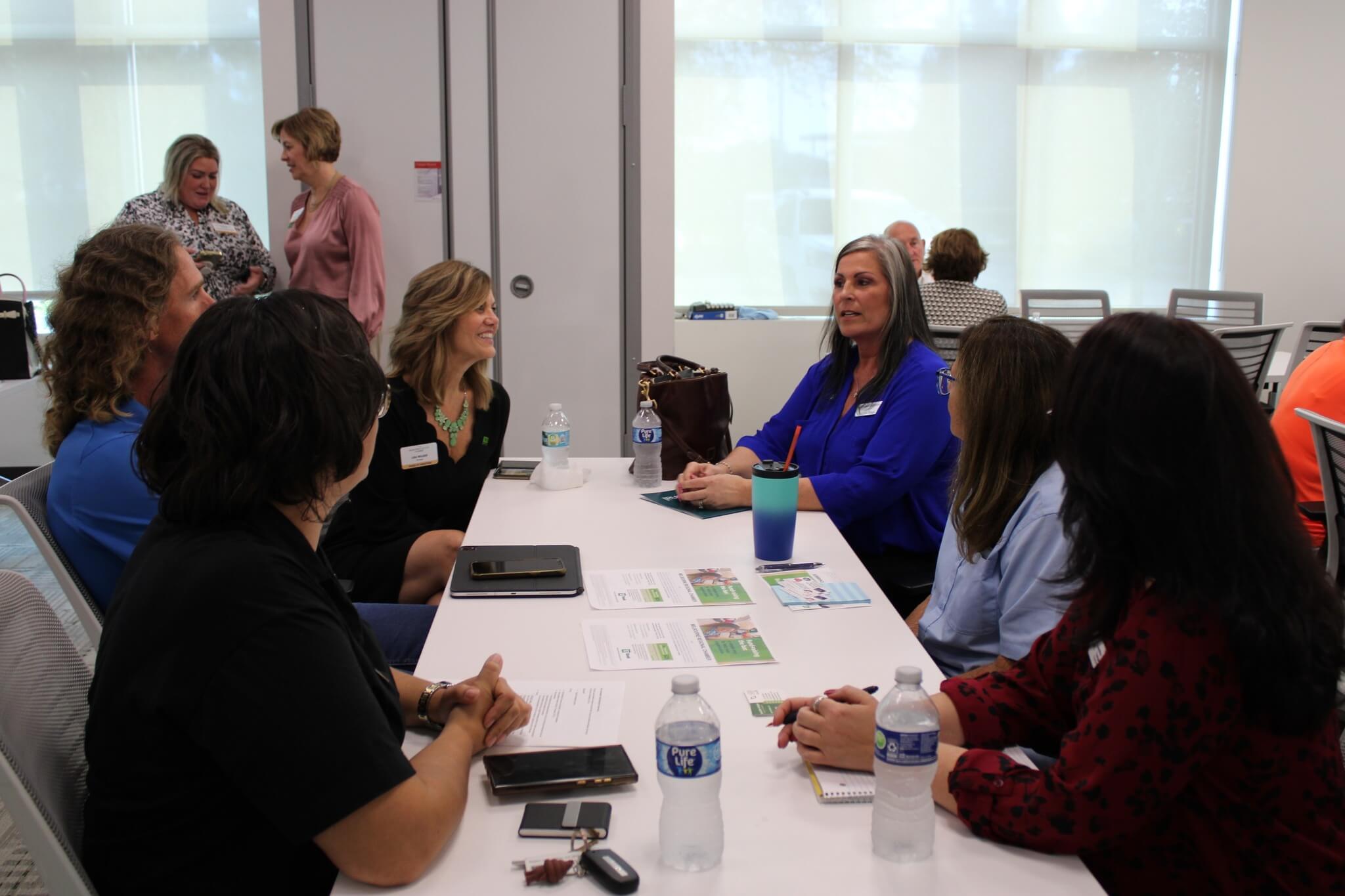 group seated around table