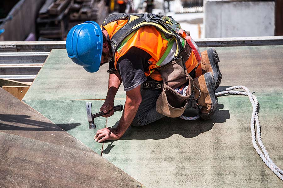 Worker on roof