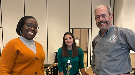 3 people smiling