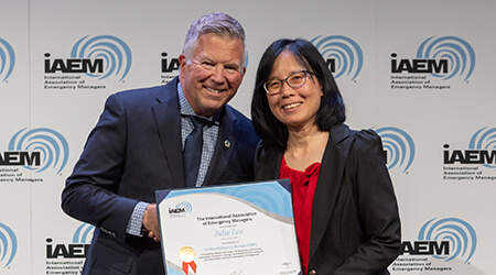 woman receiving certificate