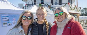 Visitors and attendees enjoying the Eastern Shore Sea Glass & Coastal Arts Festival in St. Michaels, MD
