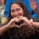 Scholarship winner Gome's Daughter and a picture from her cvideo