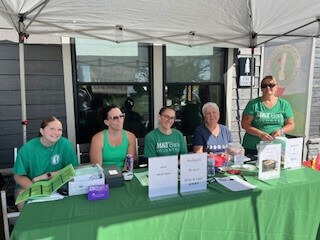 Chamber Golf Tournament Volunteers working at registration table