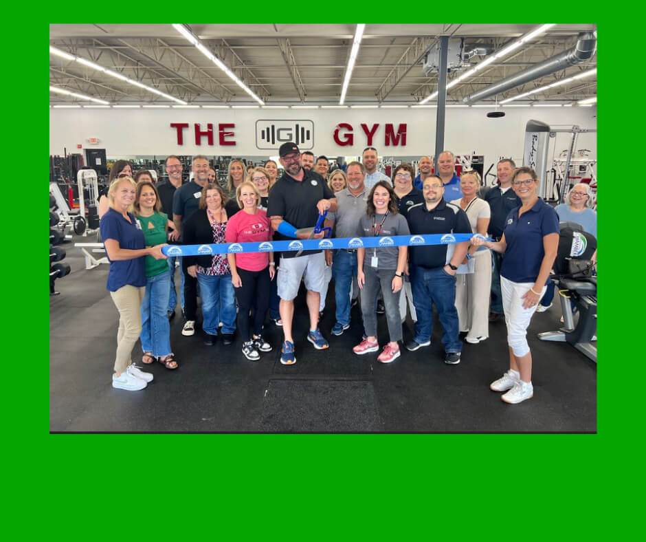 group photo ribbon cutting