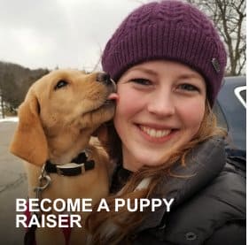 Puppy raiser Elizabeth receives a kiss on the cheek from Clifford, an adorable yellow lab puppy.