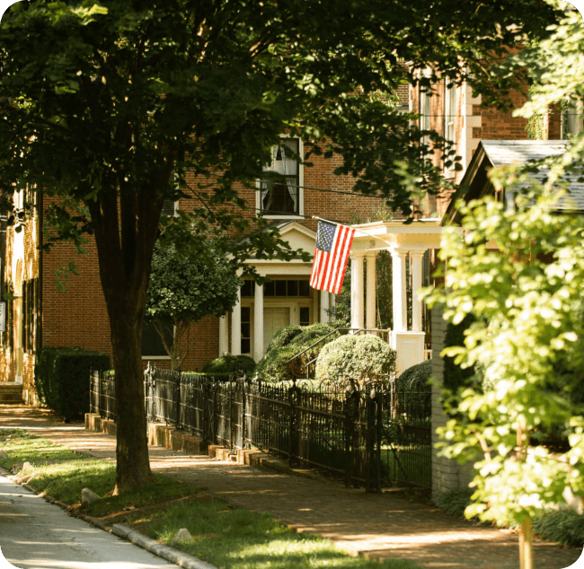 residential area with American flag on porch