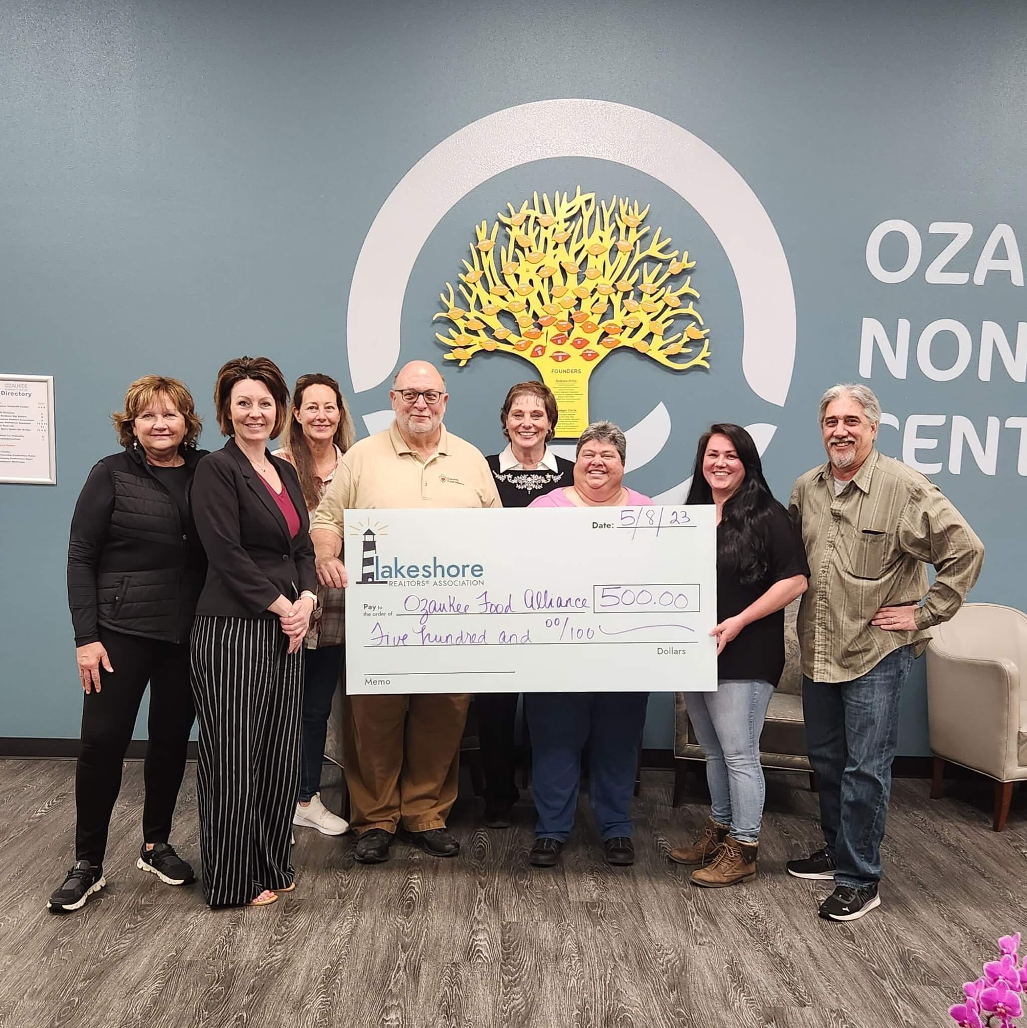 Members of the Lakeshore Realtors Association MECO Committee presented the Ozaukee Food Alliance Pantry with a $500 donation to help feed the hungry.