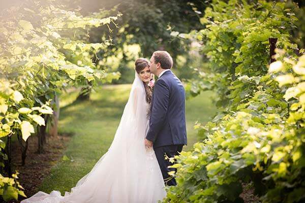 groom kissing bride