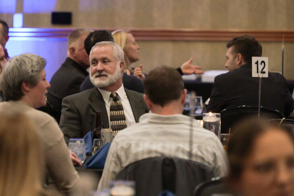 Talking attendees at the Annual Dinner