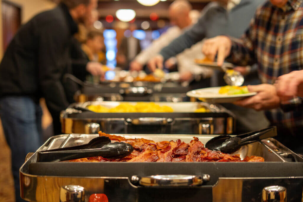 Guests mingle and network over a meal at the Annual Dinner