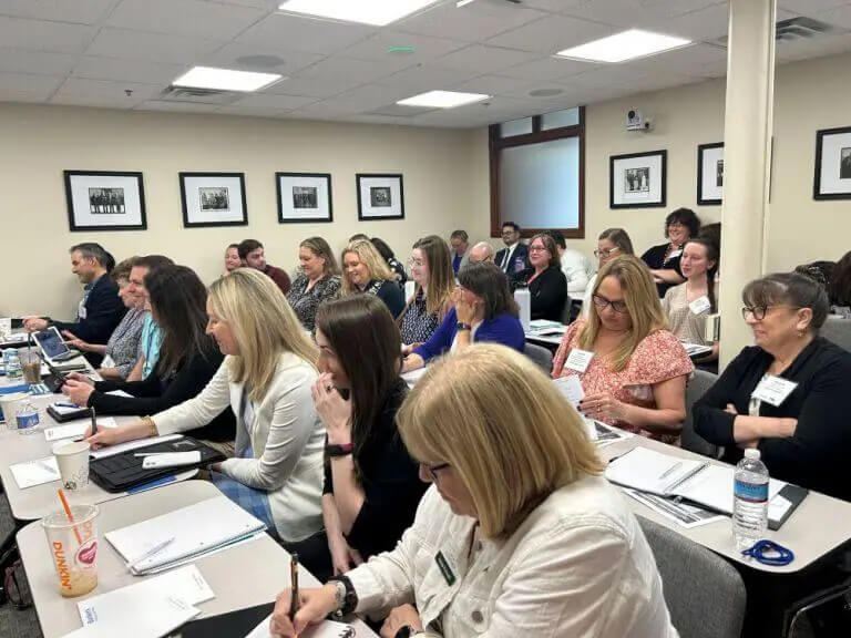 people taking notes at job focused learning