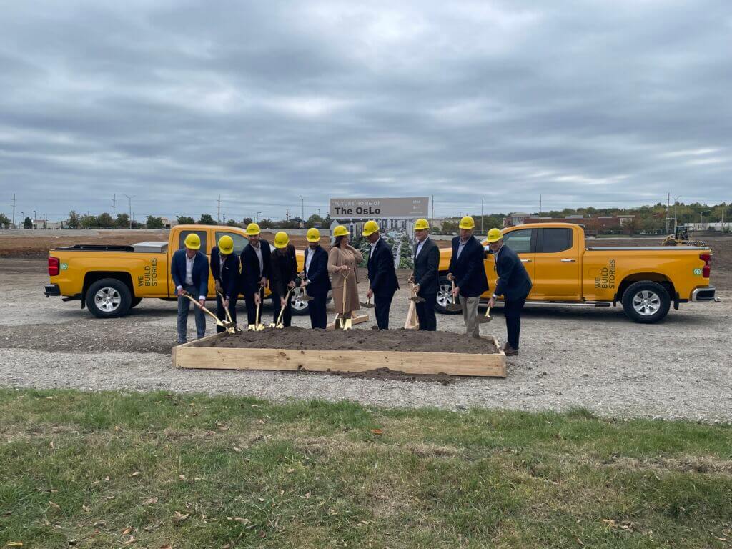 Ryan Companies, EPC Real Estate Group, and local officials join for a group picture.