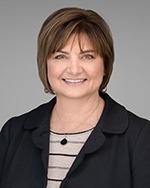Libbey M. Tucker, CEcD