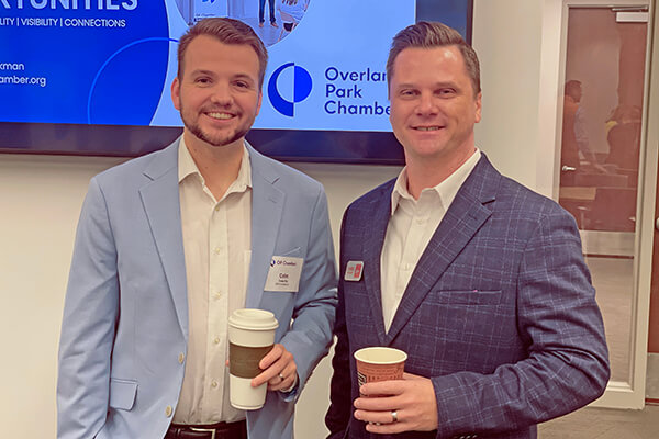 2 men smiling