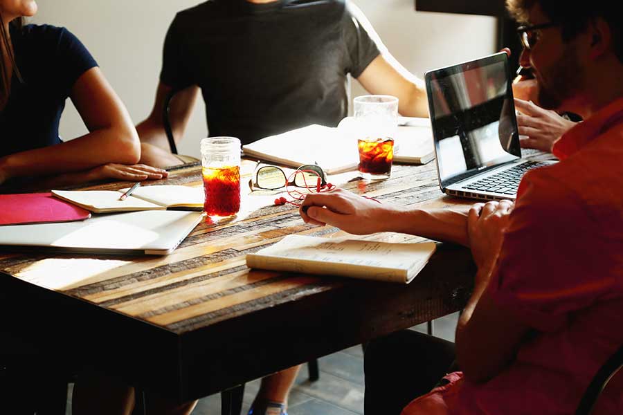 Group of people meeting at a table