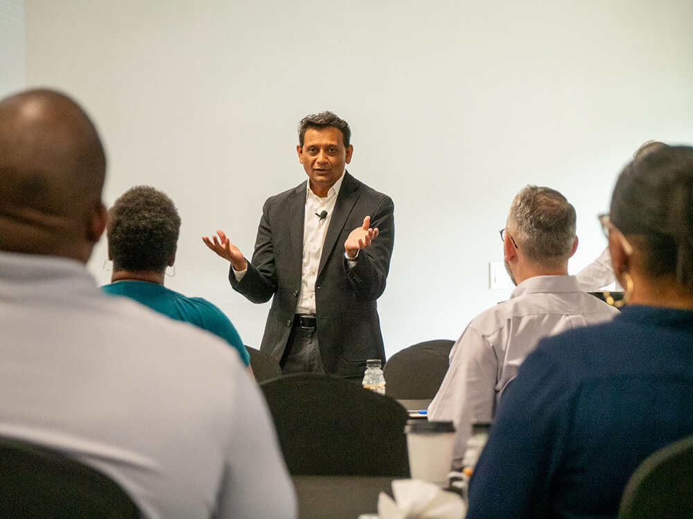 man giving presentation in front of group