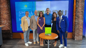 Kudzu Staffing honored as July Small Business of the Month on a TV studio set