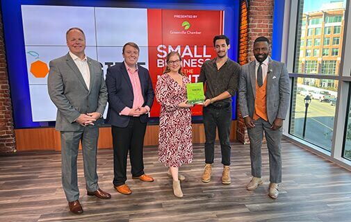 Tangible Strategies honored on a TV studio set during a Small Business of the Month segment