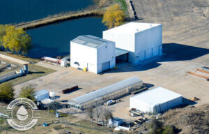 aerial of buildings next to water