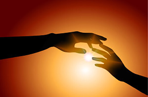 hands with sunlight in background