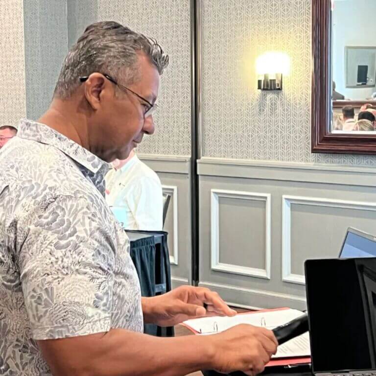 man preparing to speak at event