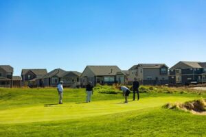 team participating in golf tournament