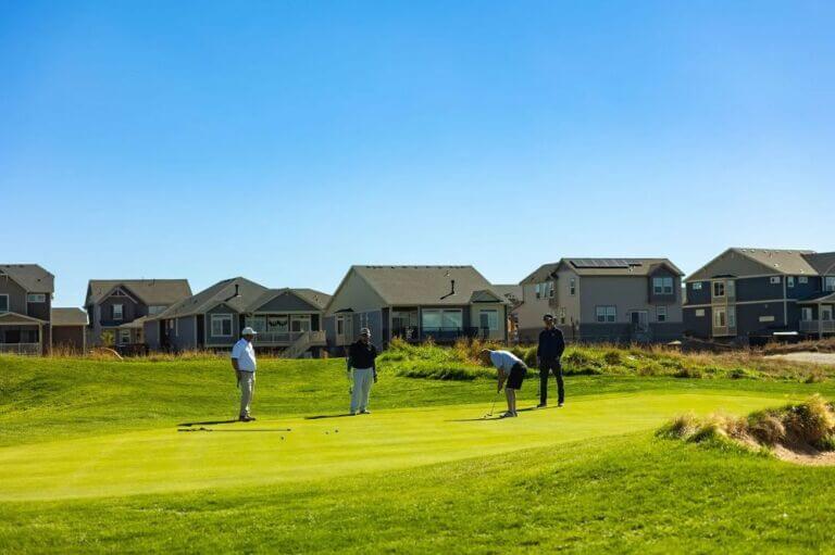 team participating in golf tournament