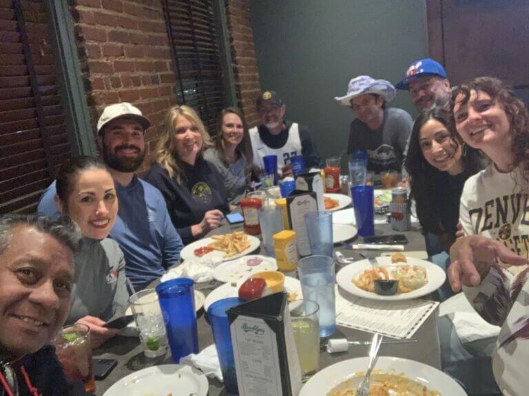 group of people at restaurant eating meal