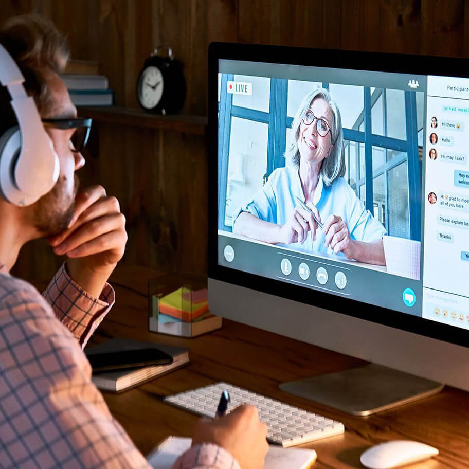 man watching video on computer