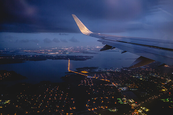 Flying on plane in a night storm over Dallas, USA