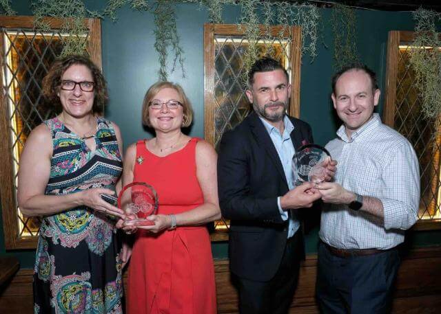 IBO Website About Page RIBO 2025 Sean McNeill Award Four IBO members holding their awards