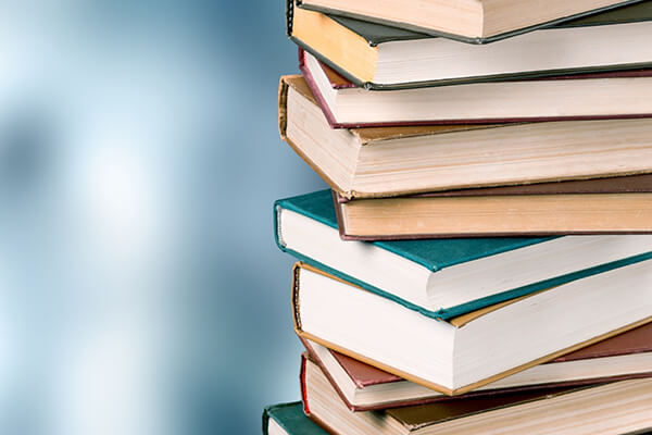 Stack of books, education and learning background