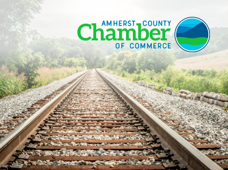 Amherst Chamber graphic with logo and train tracks in the background