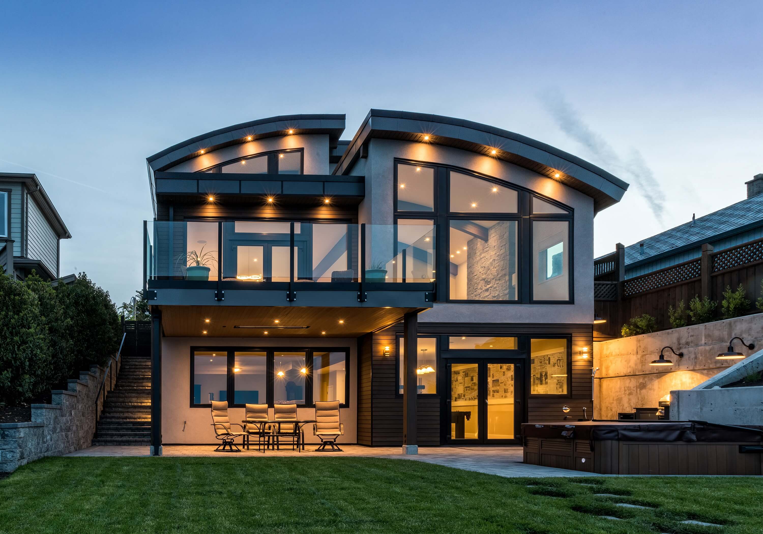 Building contractor Falcon Heights builds a new home on a seaside lot in Cordova Bay, Victoria, BC that features arched vaulted ceilings, beautiful craftsmanship and ocean views.