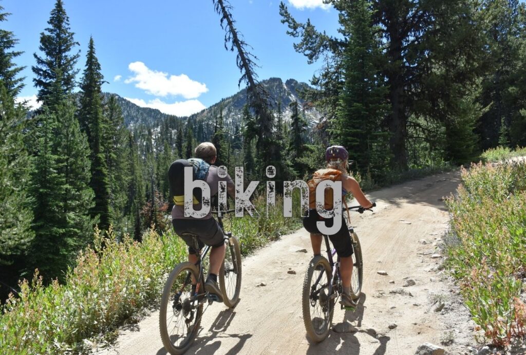 two bikers riding uphill