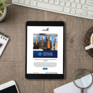 tablet laying on a desk showing the ICC newsletter with a member profile