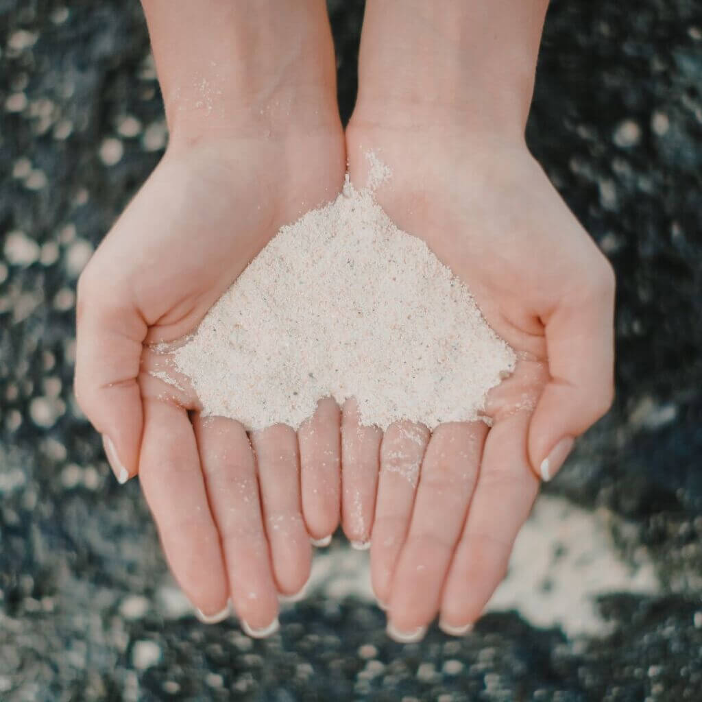 Holding a handful of silica