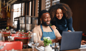 people looking at computer