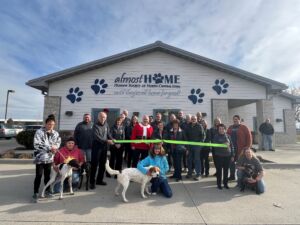 ribbon cutting almost home