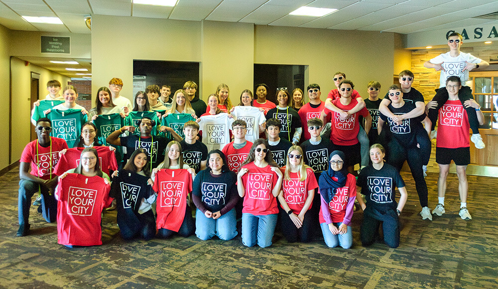 Picture of group with love your city shirts