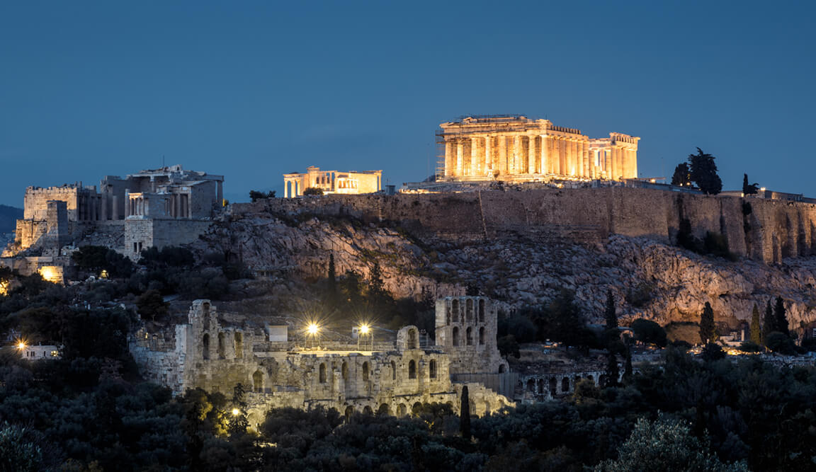 Acropolis hill with famous Parthenon at night, Athens, Greece.
