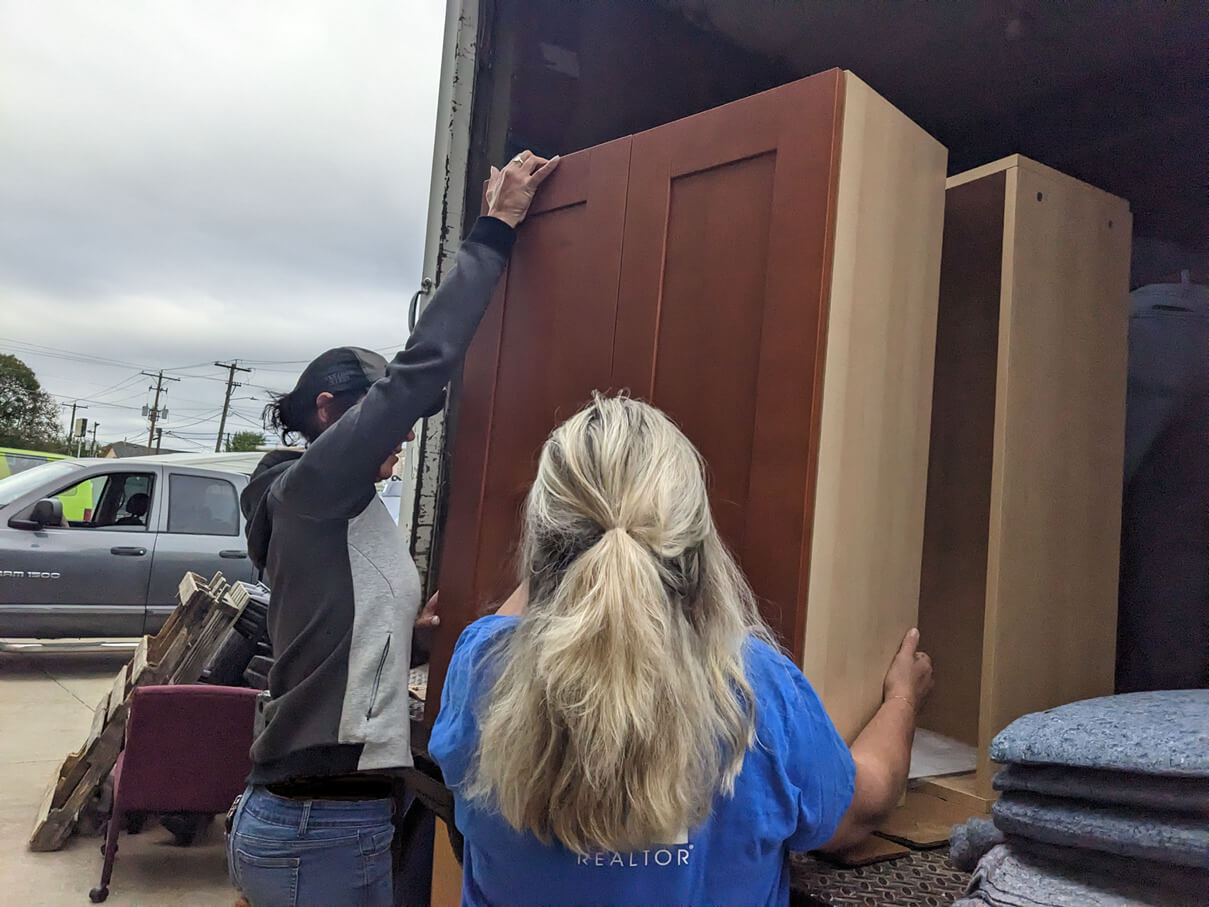 SAR members loading furniture into a truck at Habitat for Humanity